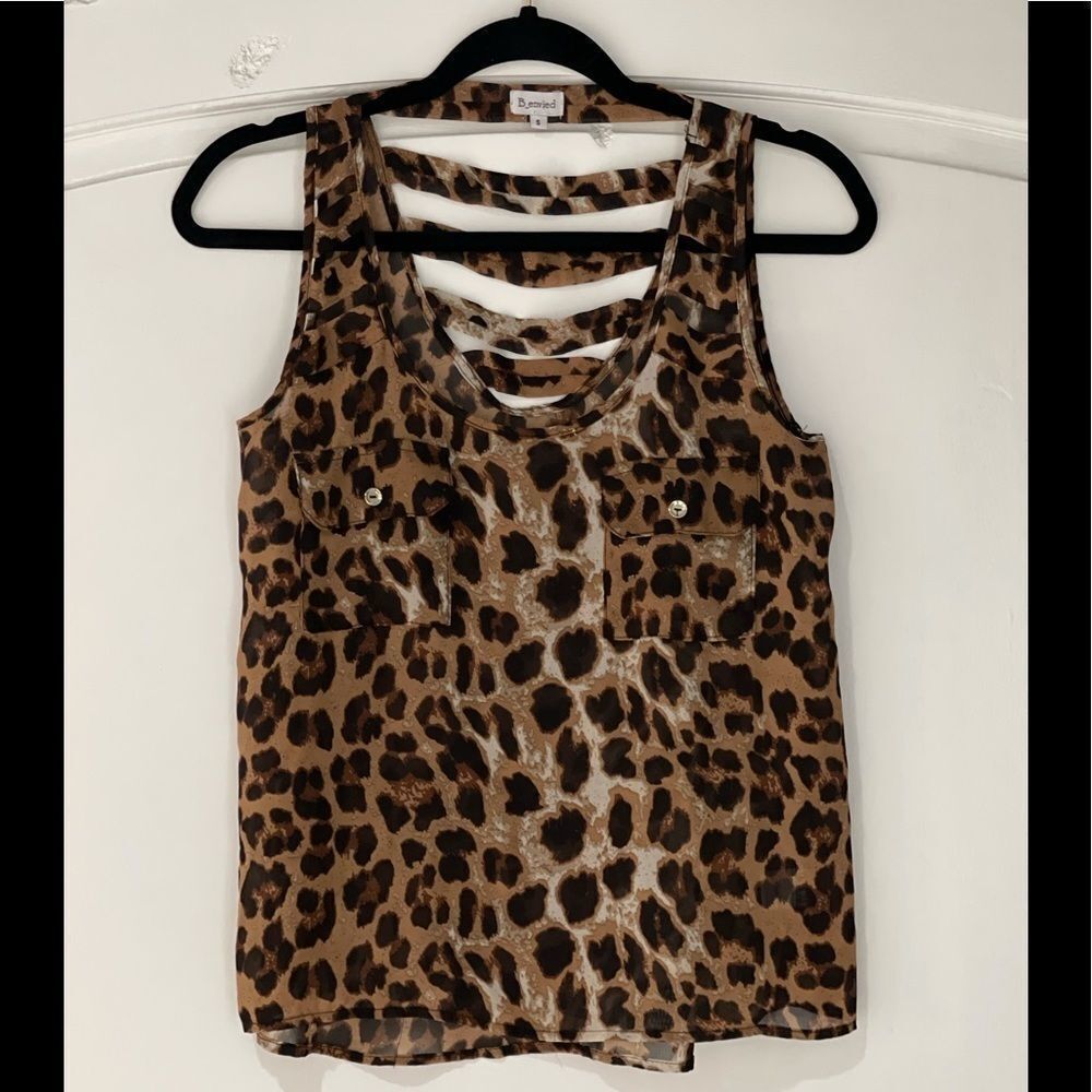 B-Envied sleeveless cheetah print blouse with front pockets